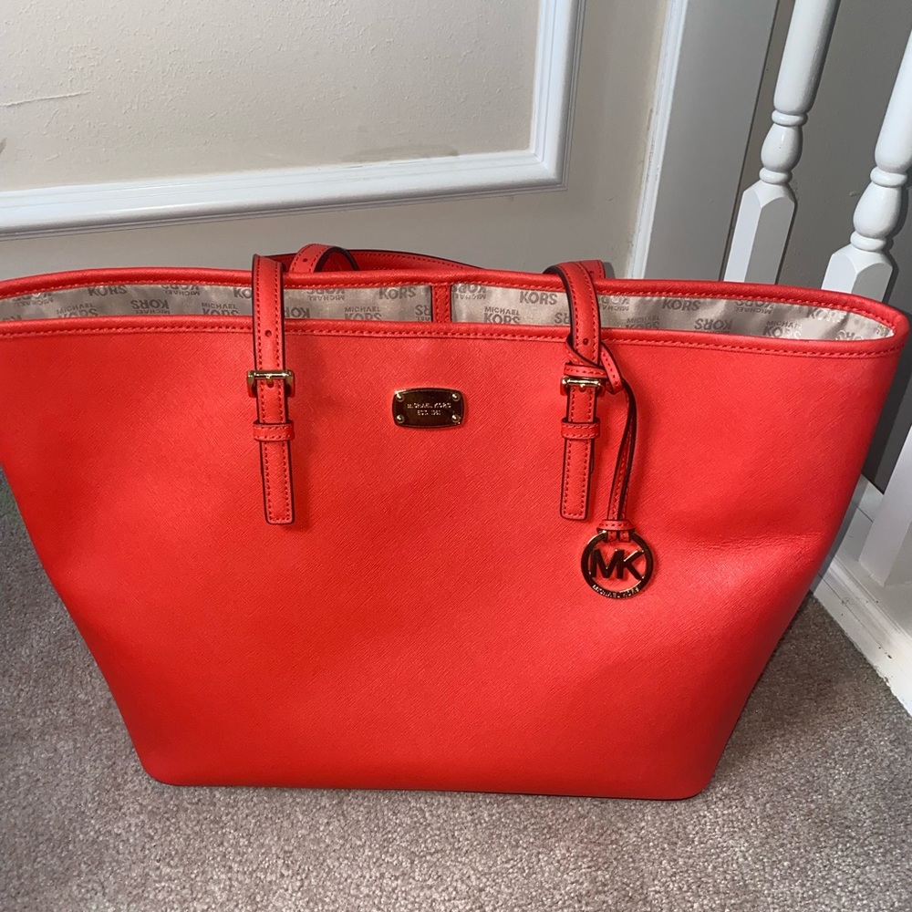 Red Michael Kors bag